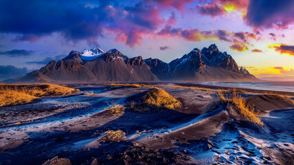 panoramic landscape at sunrise. vestrahorn mountains in stokksnes, iceland.