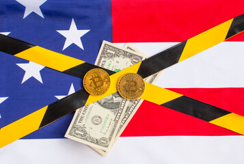 bitcoin and dollars on the American flag. The fall of the US dollar