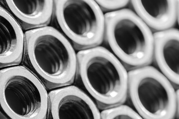 Aufkleber - Metal nuts in a row background. Chromed screw nuts. Steel nuts pattern. Tools for work.