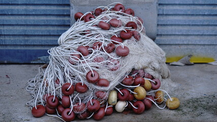 Wall Mural - fishing net with buoys stacked