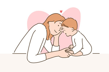 a mother is looking lovingly at her baby. hand drawn style vector design illustrations.
