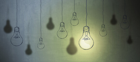 Wall Mural - Abstract light bulb sketch on concrete wall background. Idea concept.