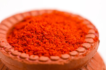 Wall Mural - Red chilli powder in a bowl with dry red chilli