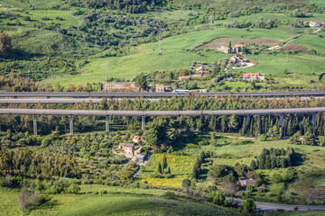 Wall Mural - A19 highway on Sicily Island in Italy, view from Rock of Ceres in Enna town