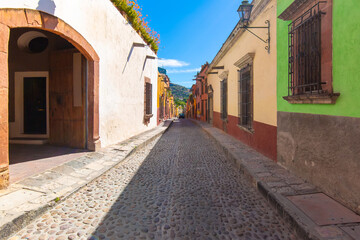 Wall Mural - Mexico, Colorful buildings and streets of San Miguel de Allende in historic city center.