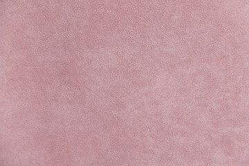 background with pink velours texture, close-up