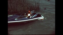 Clear Lake Racer Returns 1967

A Speedboat Racer Returns To The Race After Mechanical Difficulties In The Third Annual Clear Lake Endurance Marathon At Clear Lake, California In 1967. 