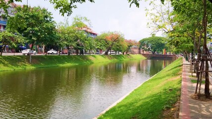 Sticker - The lush greenery along the Old City Moat, Chiang Mai, Thailand