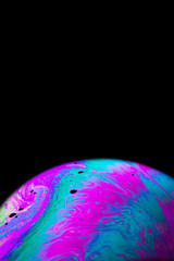 Wall Mural - Space galaxy planet. Globe earth in galaxy universe with abstract sun on black background. Color abstract fluorescent inks in water.
