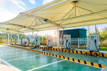 A solar powered electric car charging station in a public parking