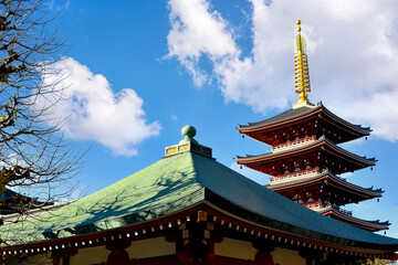 Wall Mural - the red pagoda in sensoji temple, or asakusa temple, is a buddhist temple in asakusa, taito ward, to