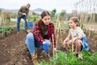 © JackF - Mother and daughter working in the garden