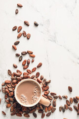 Composition with cocoa drink on light background