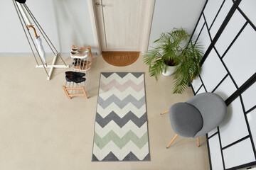 Poster - Stylish rug in interior of modern hallway