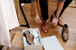 © Rawpixel.com - A casual man is trying on a new leather shoes