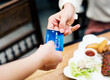 © Rawpixel.com - Woman paying lunch with credit card at restaurant