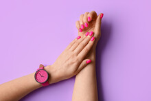 Woman With Beautiful Manicure And Wristwatch On Color Background