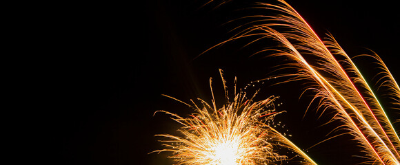 Fireworks yellow on a black background