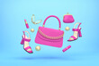 Women's handbag, shoes, purse, lipstick, mirror flying over blue background