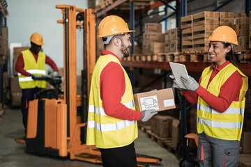 Sticker - Happy multiracial workers having fun inside warehouse - Focus on woman face