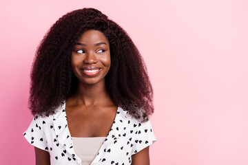 Sticker - Photo of pretty positive dark skin lady look interested empty space toothy smile isolated on pink color background