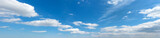 Fototapeta Desenie - Blue Sky background with tiny Clouds. Panorama background