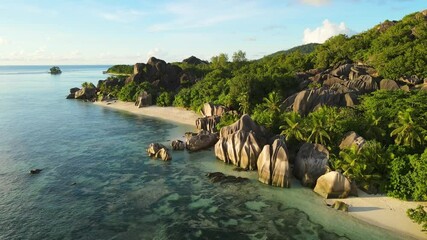 Wall Mural - Anse Source d'Argent beach in La Digue island, Seychelles. Paradise holiday vacation destination, scenic landscape with turquoise sea water and white sand. Aerial drone video footage 4k 60fps