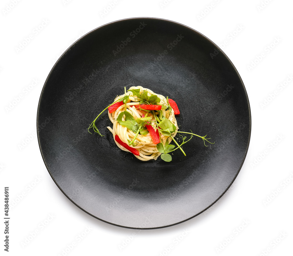 Plate with tasty pasta on white background