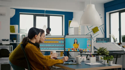 Poster - Two photographers advising for retouching client photo in creative media agency office. Graphic designers working at client assets on PC with two displays in photo editing software holding stylus pen