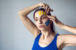 © saulich84 - portrait of a young woman with pasted konesiotape for rejuvenation and face tightening
