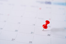 Picture Of Red Pin Embroidered The 22nd On The Calendar.
