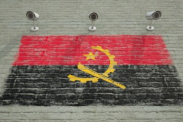 Brick wall with printed national flag of Angola and CCTV cameras. Surveillance system conceptual 3D rendering