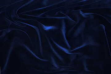 Wall Mural - Blue fabric waves background textured close up of a textile background