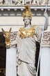 statue of athena in front the austrian parliament in vienna (austria)