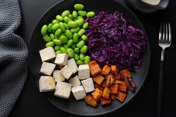 Wall Mural - Appetizing vegan bowl with tofu on plate