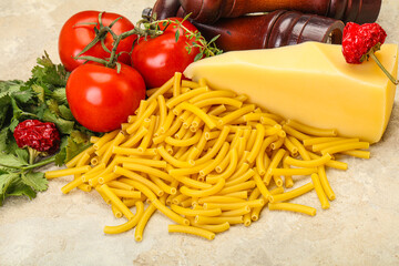 Italian pasta raw Maccheroni for cooking