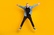 © deagreez - Full length photo of cool granddad jump wear jacket pants isolated on yellow color background