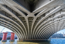 The Underside Of Blackfriars Railway Bridge Over The River Thames  With Some Of The Remaining Columns From The Old Bridge