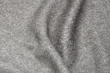 Wall Mural - Close-up texture of natural gray fabric or cloth in gray color. Fabric texture of natural cotton or linen textile material. Gray canvas background.