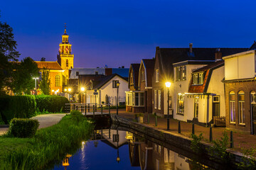 Wall Mural - Street view at night old historic dorpsstraat Zoetermeer