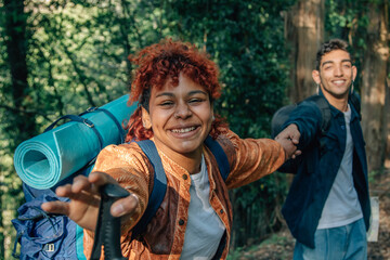 young multiethnic couple enjoying the trip or excursion