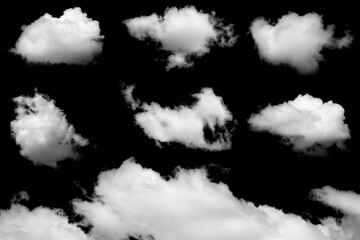 Wall Mural - set of isolated clouds on black background.