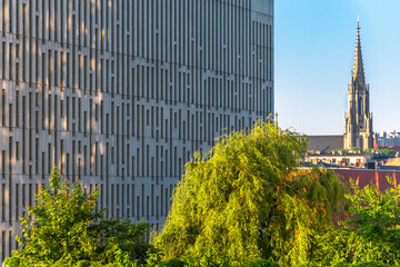 Katowice, Silesia, Poland; June 4, 2021: Close-up on the office building in modern business center against city scape