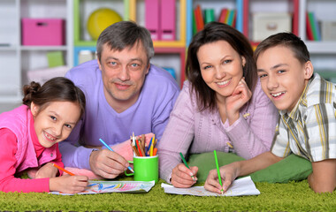 Wall Mural - Big family lying on floor