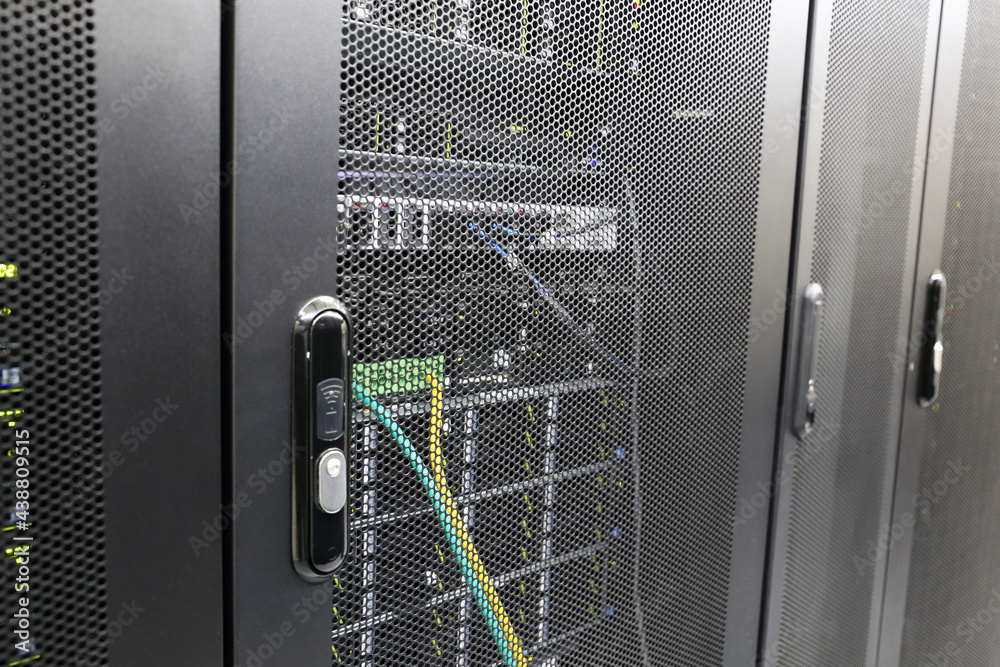 Network Rack Security Electronic lock on server rack in data center. Server room, computer ...