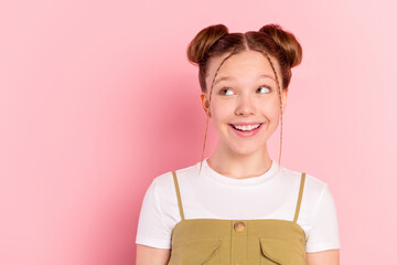 Poster - Portrait of attractive cheerful funky pre-teen girl creating new solution copy space isolated over pink pastel color background