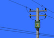 Cement high voltage electric pole and transformer with blue background copy space flat vector.