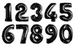 inflatable black numbers made of foil on a white isolated background
