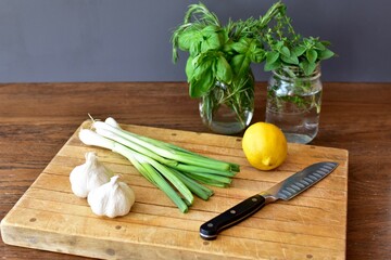 Fresh green herbs for preparing and cooking healthy Mediterranean or Italian diet. Food background, lifestyle, close-up, copy space