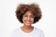 © Damir Khabirov - Close-up portrait of smiling african student girl in white t-shirt and round glasses, isolated on gray background